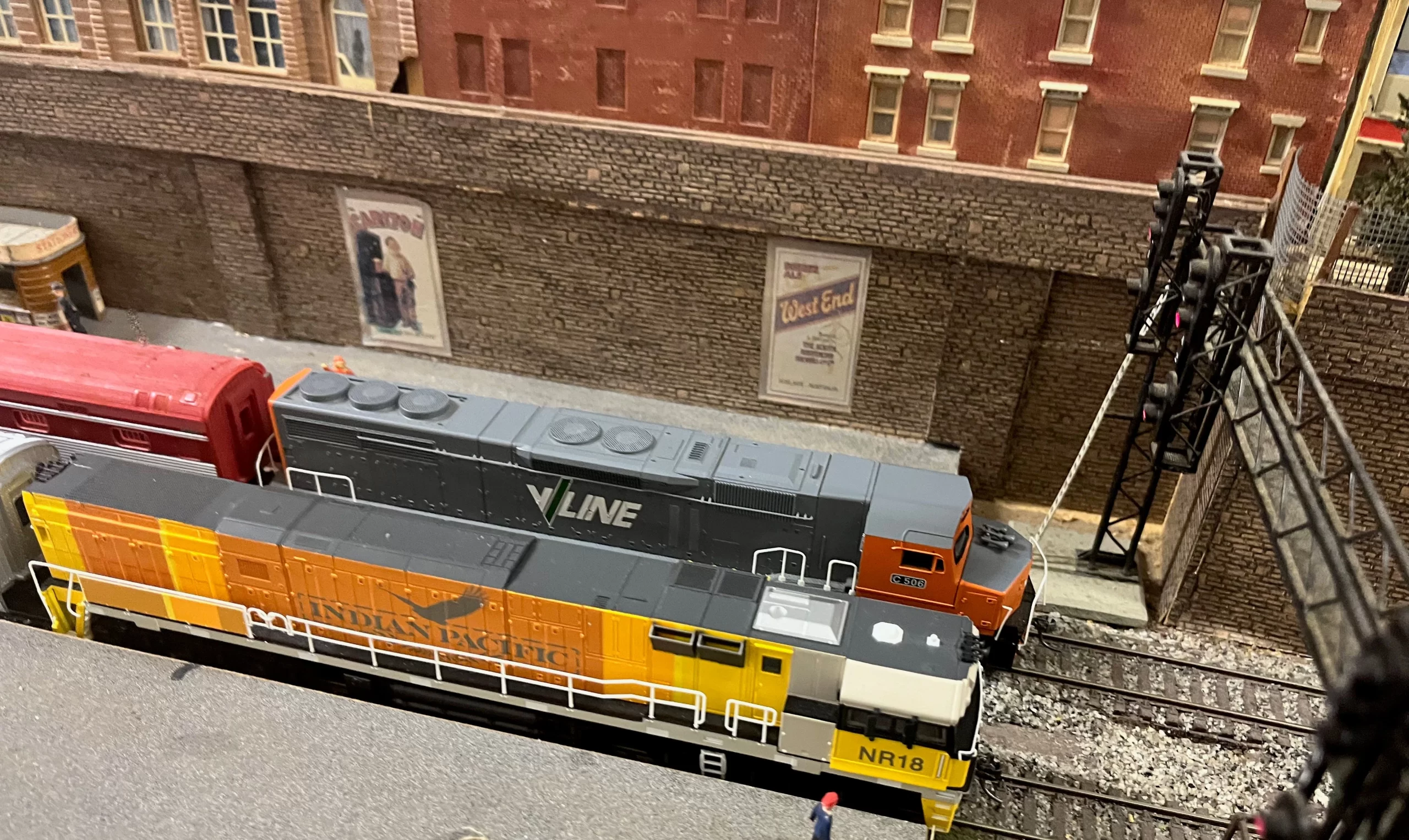 V/Line C506 waits alongside National Rail NR18.